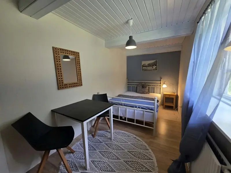 Lykkebo Apartment Comfortable bedroom interior in Lykkebo Apartment
